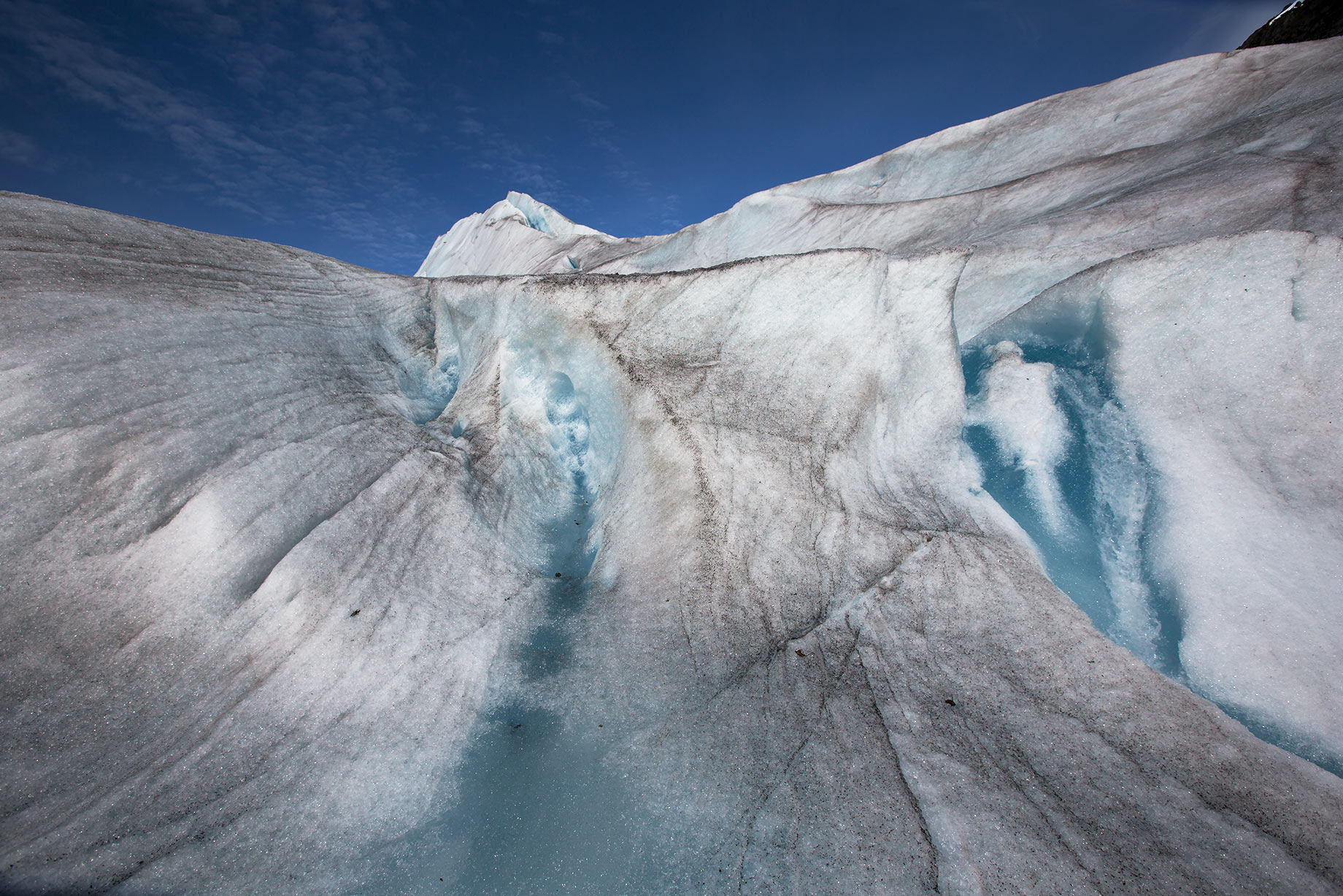 Photofolio_web_InsideGlacierWithEyesBlueskyAlaska_1